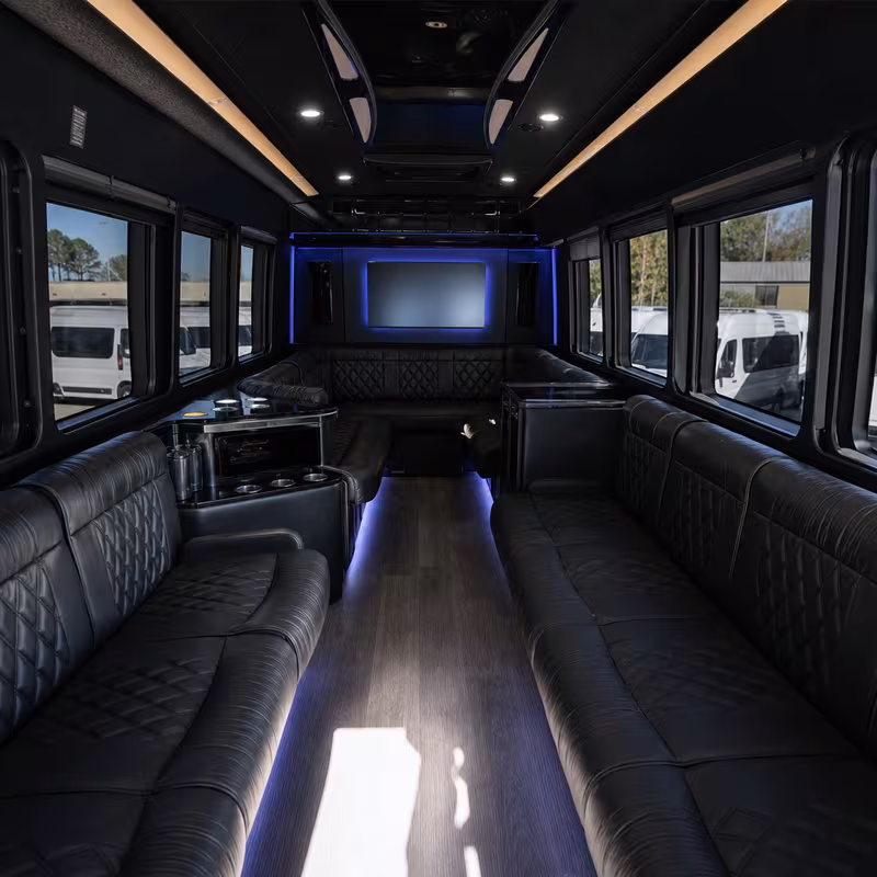 Friends laughing during a Indianapolis party bus celebration