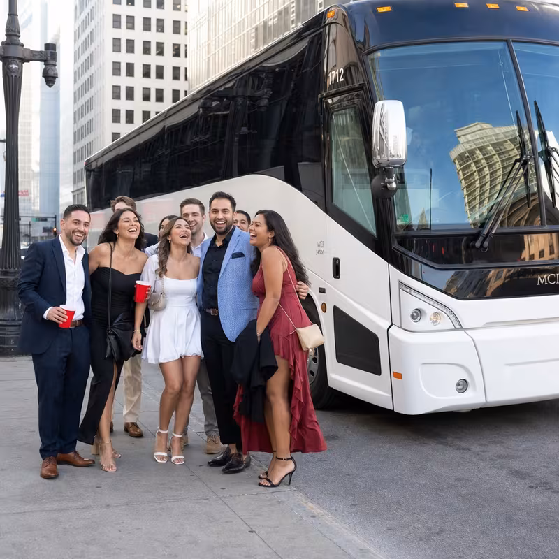 Passengers loading luggage while boarding an Indianapolis group shuttle