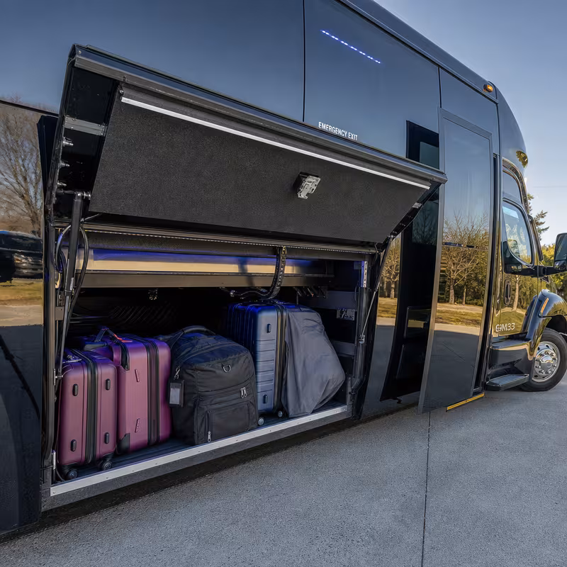 Party bus interior with wraparound leather seating and LED lighting in Indianapolis